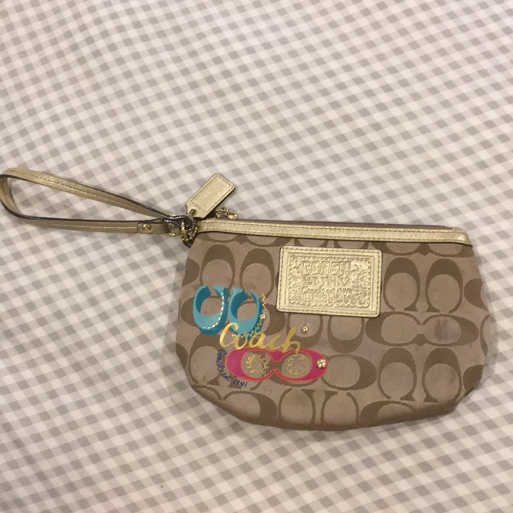 Coach Wristlet. Good condition, few minor dings.